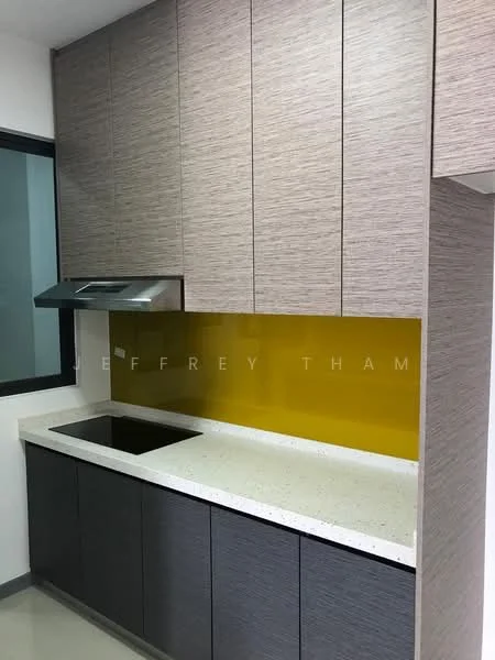 Kitchen features: laminate cabinetry in light wood finish, dark cabinetry with textured surface, white speckled countertop, built-in induction cooktop, stainless-steel range hood, yellow glass backsplash, single-bowl stainless-steel sink, wall-mounted storage cabinets, window for natural light; style: modern.