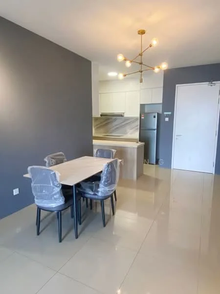 Dining features: dining table with light wood surface, 4 upholstered dining chairs with transparent covers, grey painted accent wall, white walls, recessed ceiling lights, modern chandelier with multiple bulbs, glossy tile flooring, open kitchen layout visible in background, kitchen cabinetry with white finish, stainless-steel refrigerator visible; style: modern.