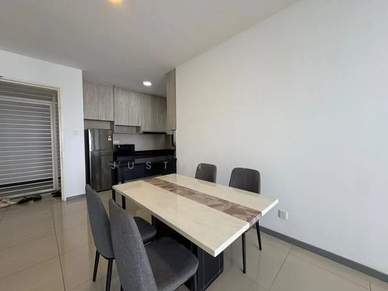Dining features: rectangular dining table with marble top, 4 upholstered dining chairs in grey, light grey tiled flooring, white painted walls, kitchen cabinetry with wood finish, black kitchen appliances including fridge, recessed ceiling lights, open layout to kitchen area; style: modern.