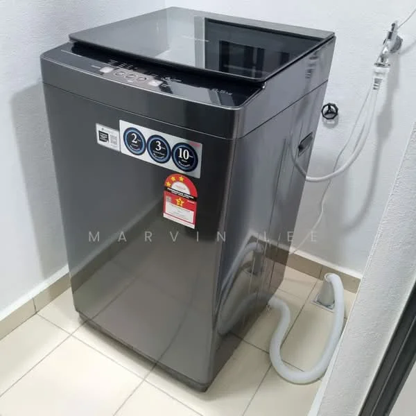 Laundry features: top-load washing machine in grey, water inlet hose, drain hose, control panel with buttons, stainless-steel drum, white tiled walls, cream tiled flooring; style: modern.