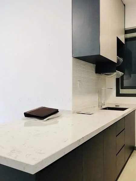 Kitchen features: white marble countertop, black cabinetry, light-colored upper cabinets, subway tile backsplash, stainless-steel sink, chrome faucet, built-in cabinet handles, flat-panel cabinet doors; style: modern.