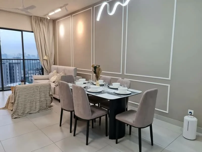 Dining features: 6-seater dining table, upholstered dining chairs in beige, white plates, glass tabletop, decorative vase with dried flowers, pendant light fixture, grey accent wall with paneling, floor-to-ceiling windows, curtains, sofa in light grey, beige throw blanket, tile flooring; style: modern; view: city.