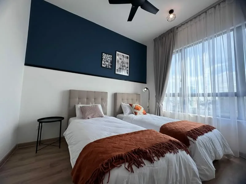 Bedroom features: two single beds with beige upholstered headboards, white bedding, orange throw blankets, black bedside table, floor-to-ceiling windows with sheer curtains, blue accent wall, wooden flooring, ceiling fan with light, decorative wall art; style: modern; view: city.