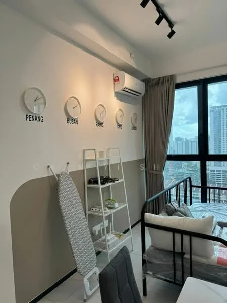 Room features: white painted walls, grey accent wall, floor-to-ceiling windows, curtains, wall-mounted split AC, 6 wall clocks with city names, iron board, open shelving unit, bed with bedding, grey upholstered chair, light fixture with track lighting, tile flooring; style: modern; view: city.