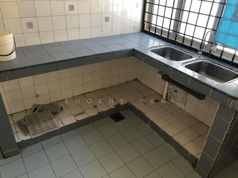 Kitchen features: double-bowl stainless-steel sink, chrome pull-down faucet, white tiled backsplash, grey tiled countertop, blue tiled edges, white tiled flooring, open shelving, window with metal grille, natural light from window.