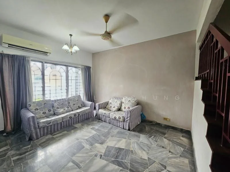 Living features: 2-seater fabric sofa with floral pattern, 3-seater fabric sofa with striped pattern, marble tile flooring, white painted walls, ceiling fan, window with decorative grille, curtains, air conditioning unit, chandelier.