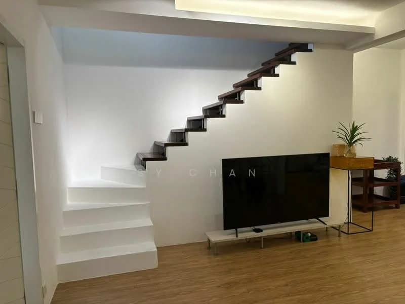 Living features: white painted walls, wooden staircase with dark wood treads, flat-screen TV on a low media console, laminate flooring in light wood finish, decorative plant on a wooden side table, open space design, recessed ceiling lights, minimalist decor; style: modern.