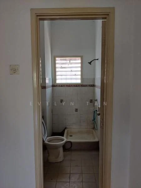 Bathroom features: white tiled walls, cream tiled flooring, one-piece toilet, shower area with wall-mounted shower head, window with horizontal slats, toilet paper holder, sink with faucet, mirror above sink.