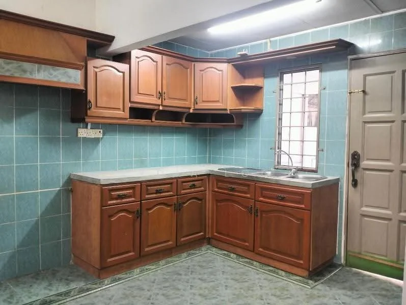 Kitchen features: wooden cabinetry with brown finish, grey laminate countertop, single-bowl stainless-steel sink, chrome faucet, blue tiled backsplash, green tiled flooring, wall-mounted cabinets, window with grid pattern, door with panel design; style: traditional.