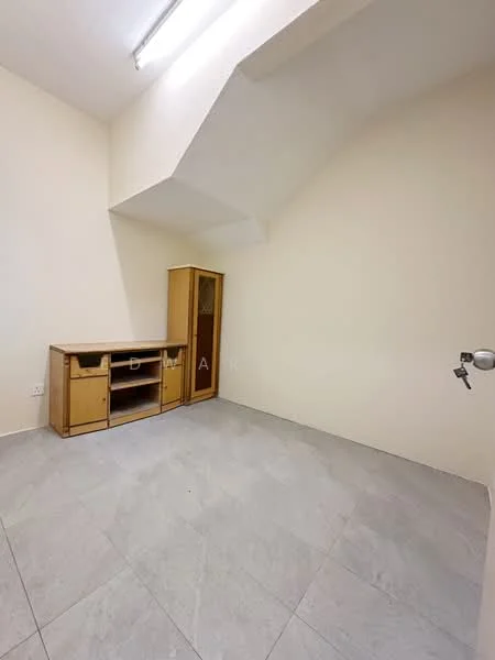 Room features: light grey tiled flooring, plain white walls, built-in wooden cabinet, corner shelving unit, sloped ceiling, single door, fluorescent ceiling light; style: minimalist.