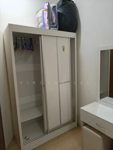 Room features: white sliding wardrobe, open shelving inside wardrobe, hanging rod for clothes, mirror with white frame, white dressing table, light wood flooring, stacked bags on top of wardrobe; style: modern.