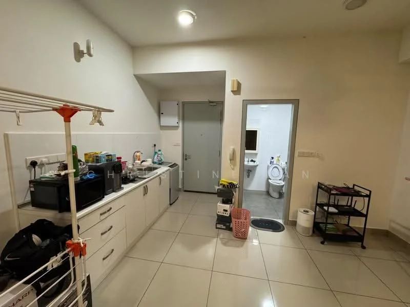 Room features: white painted walls, glossy tile flooring, kitchen cabinetry with countertop, microwave, black fridge, washing machine, open shelving, door leading to bathroom, sink, small cart with wheels, laundry rack, light fixture on ceiling; style: modern.
