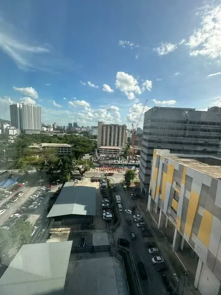 Exterior type: high-rise condominium; features: city skyline view, surrounded by urban landscape, multiple high-rise buildings, open sky with clouds, street view with vehicles, greenery visible in the foreground; style: modern.