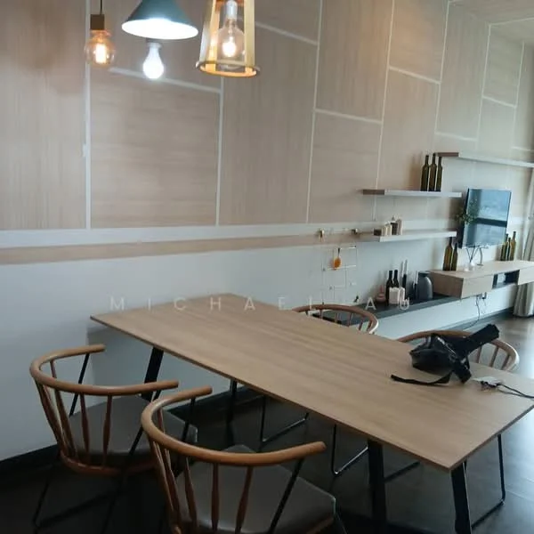 Dining features: wooden dining table, 4 wooden dining chairs with black cushions, wall-mounted TV, light wood paneling on walls, shelves with decorative bottles, dark wood flooring, hanging pendant lights, recessed lighting; style: modern.