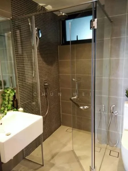 Bathroom features: walk-in shower with glass enclosure, rain shower head, handheld shower, chrome wall-mounted faucet, white square sink, grey tiled walls, mosaic tile accent wall, light grey floor tiles, two chrome towel holders, window for natural light, greenery decor; style: modern.