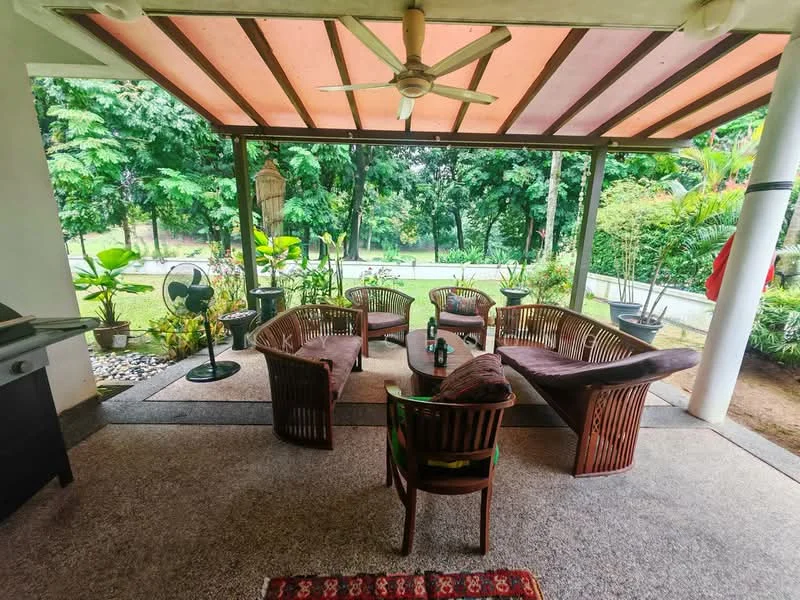Patio features: outdoor seating area with curved wooden chairs, rectangular wooden coffee table, ceiling fan, stone flooring, greenery view, decorative rug, outdoor grill, potted plants; style: tropical; view: garden.