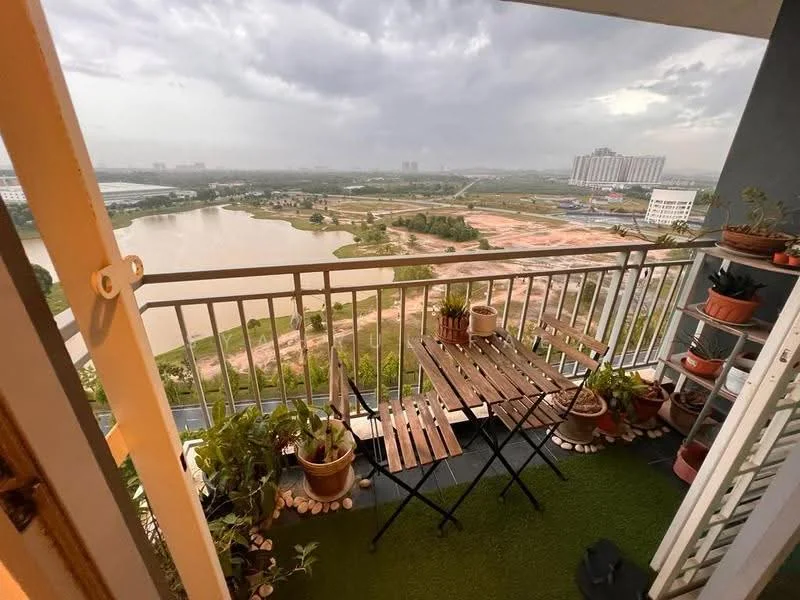 Balcony features: metal railing, wooden folding table, two folding chairs, artificial grass flooring, potted plants, view of water body, view of landscape, decorative stones; view: landscape.