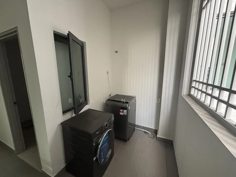 Laundry features: two black front-load washing machines, grey tiled flooring, white painted walls, window with metal grille, corner location, plumbing connections visible, electrical outlet, shelving unit, natural light from window.