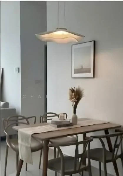 Dining features: wooden dining table, 4 dining chairs, pendant light fixture, framed artwork on wall, decorative vase with dried flowers, table runner, ceramic mug, small decorative box; style: modern.