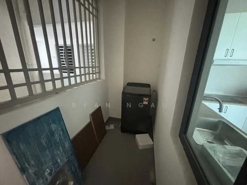 Laundry features: washing machine, grey tiled flooring, white painted walls, window with security bars, corner space for storage, small white plastic container, blue board leaning against the wall.