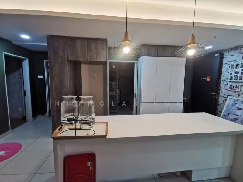 Kitchen features: white cabinetry, island countertop, pendant lighting, stainless-steel refrigerator, grey accent wall, tile flooring, open shelving, glass jars on countertop, wall-mounted photo display, recessed ceiling lights; style: modern. Room features: doorway leading to hallway, doorway leading to another room, light switch, wall with wood paneling.