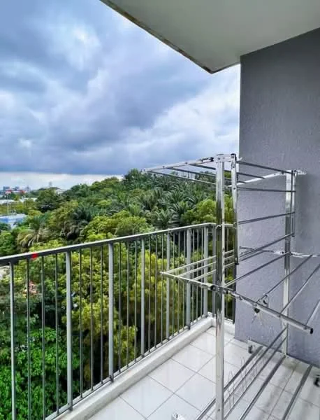 Room features: balcony, metal railing, tile flooring, clothes drying rack, view of greenery, cloudy sky; view: garden.