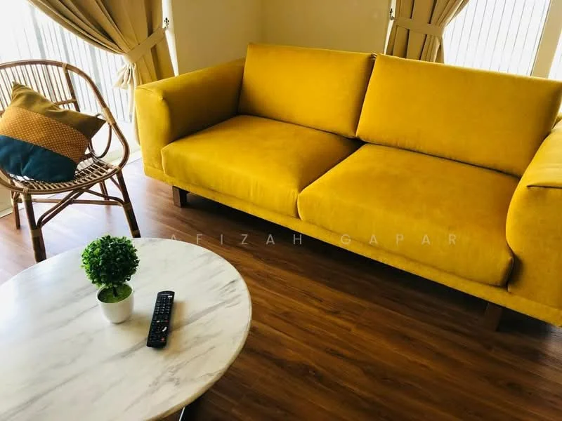 Living features: yellow fabric sofa, marble coffee table, wooden flooring, decorative plant on table, remote control on table, curtains, cushion with geometric pattern, rattan chair; style: modern.