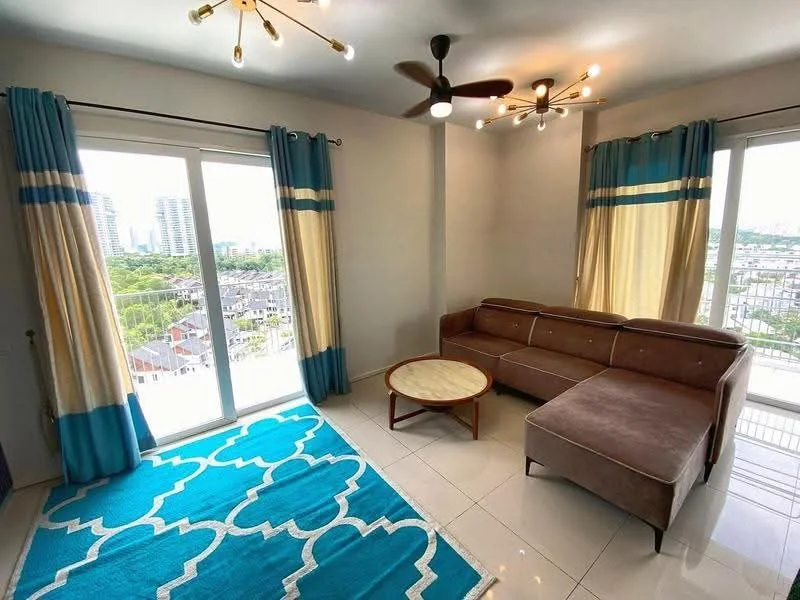 Living features: 3-seater sectional sofa in brown, round coffee table with wooden top, area rug with geometric pattern in blue and white, floor-to-ceiling windows, sheer curtains in cream and blue, 5-blade ceiling fan with light, recessed downlights, cream painted walls, glossy tile flooring; style: modern; view: city.