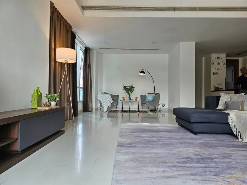 Living features: grey fabric sectional sofa, area rug with geometric pattern, wooden coffee table, floor lamp, table lamp, decorative plants, wall-mounted clock, TV console, curtains, large windows, white painted walls, recessed lighting; style: modern; view: city.