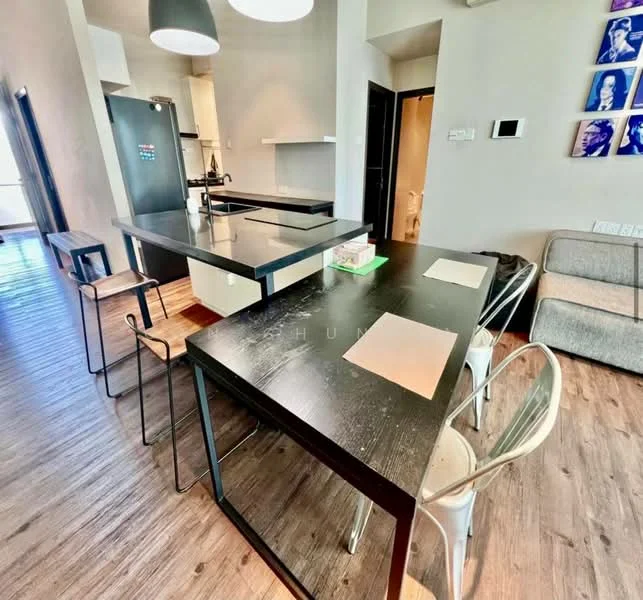 Kitchen features: black dining table with four chairs, open-plan layout, wooden flooring, pendant lighting, kitchen island, stainless-steel appliances, black cabinetry, white walls, recessed lighting, countertop with bar seating; style: modern. Living features: grey fabric sofa, wall-mounted TV, artwork on walls; style: modern.