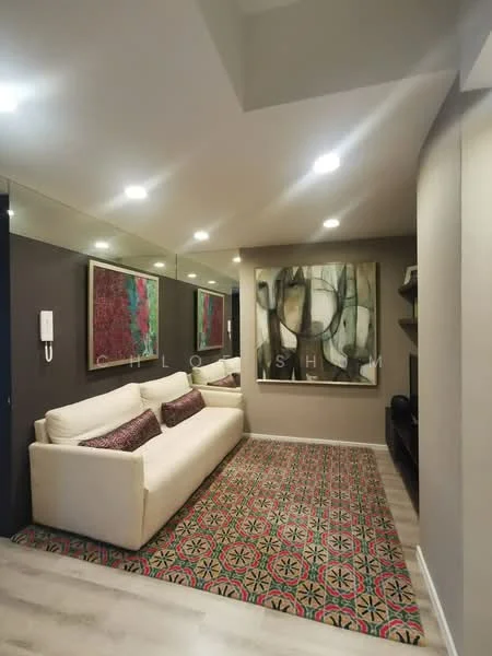 Living features: 3-seater fabric sofa in cream, decorative throw pillows, area rug with geometric pattern, wall-mounted TV, shelves for decor, framed artwork on wall, mirrored wall, recessed LED downlights, light grey painted walls, wooden flooring; style: modern.