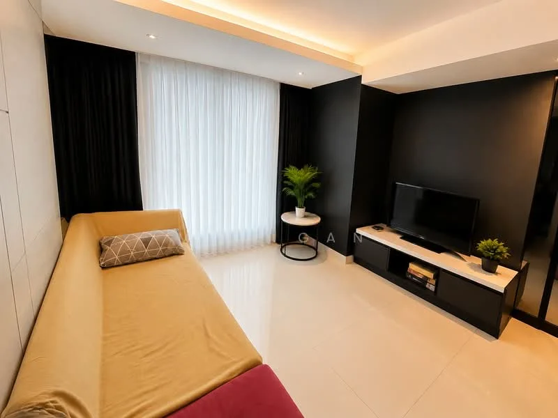Living features: cream painted walls, black accent wall, large floor-to-ceiling windows with sheer curtains, light-colored sofa with decorative cushion, white side table, black TV console, wall-mounted TV, decorative plants, recessed ceiling lights, glossy tile flooring; style: modern.