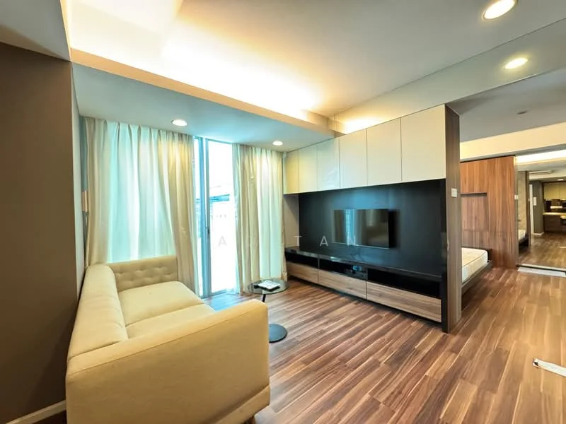 Living features: cream fabric sofa, wooden TV console, wall-mounted TV, floor-to-ceiling windows, sheer curtains, laminate flooring, recessed downlights, wood accent wall, open layout to bedroom, coffee table, decorative wall paneling; style: modern; view: city.