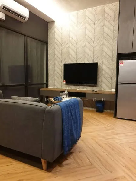 Living features: grey fabric sofa, wooden coffee table, wall-mounted TV, TV console, refrigerator, air conditioning unit, herringbone patterned accent wall, laminate flooring, decorative throw blanket; style: modern.