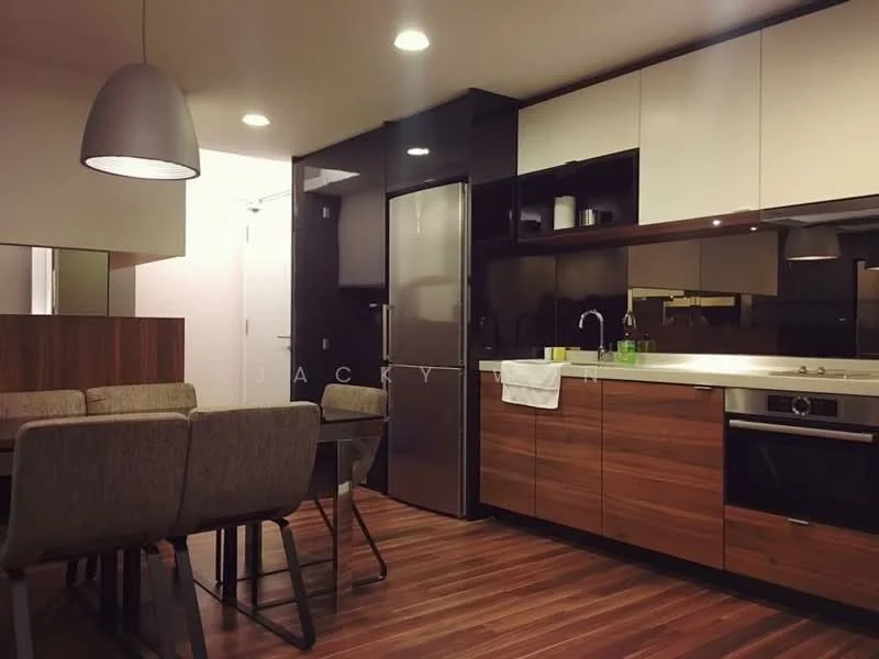 Kitchen features: stainless-steel fridge, built-in oven, 4-burner gas hob, single-bowl stainless-steel sink, chrome pull-down faucet, dark wood cabinetry, white upper cabinets, marble countertop, pendant light, recessed downlights, dining table with upholstered chairs, wooden flooring; style: modern.