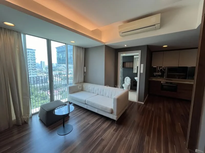 Living features: 3-seater fabric sofa in light grey, coffee table with black base, floor-to-ceiling windows, curtains in light fabric, wooden flooring, recessed downlights, wall-mounted split AC, decorative wall paneling, open layout to kitchen, view of city skyline; style: modern; view: city. Kitchen features: built-in kitchen cabinetry, stainless-steel range hood, built-in oven, cooktop, countertop with backsplash, refrigerator, under-cabinet lighting; style: modern. Bathroom features: one-piece toilet, single-sink vanity with wood cabinet, framed mirror, shower with glass enclosure, tile cladding to ceiling; style: modern.