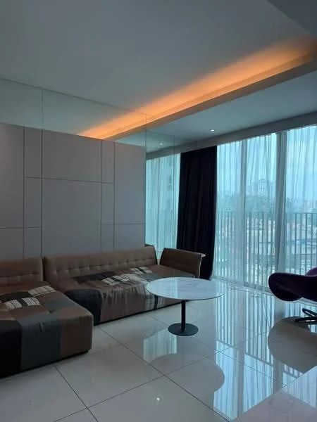 Living features: L-shape sectional sofa in beige and brown, round coffee table with black base, floor-to-ceiling windows, sheer curtains, dark curtains, white painted walls, recessed LED lighting, glossy tile flooring, decorative wall with mirror panels, city view; style: modern; view: city.