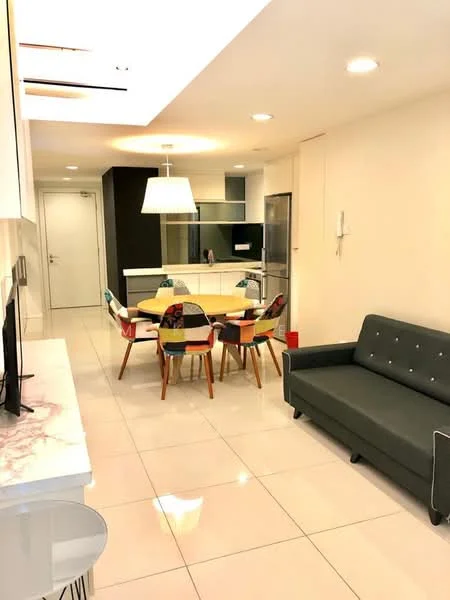 Living features: grey fabric sofa, round dining table, 6 upholstered dining chairs, wall-mounted TV, white cabinetry, marble countertop, recessed ceiling lights, white tiled flooring, open layout, kitchen area visible in background; style: modern.