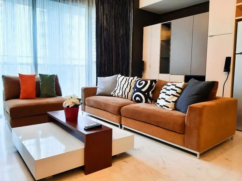 Living features: 3-seater fabric sofa in brown, 2-seater fabric sofa in brown, decorative cushions in various colors, white coffee table with wooden base, marble flooring, floor-to-ceiling windows with sheer curtains, black accent wall, built-in cabinetry, decorative wall art; style: modern.