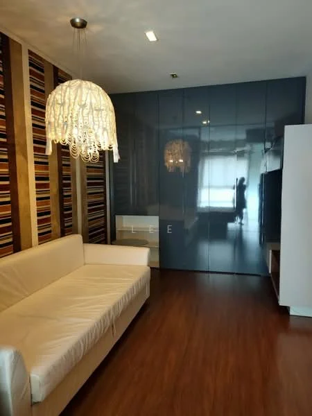 Living features: cream leather sofa, wood laminate flooring, striped wallpaper, glossy blue cabinetry, chandelier with intricate design, recessed lighting, floor-to-ceiling windows, neutral wall color; style: modern.