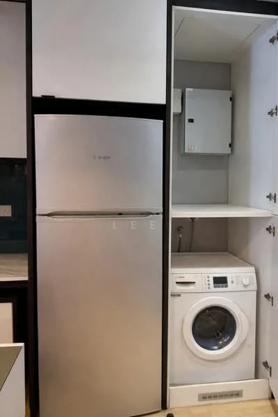 Room features: stainless-steel fridge, front-load washing machine, built-in cabinetry, white cabinetry, shelf above washing machine, electrical panel, neutral wall colour, countertop surface; style: modern.