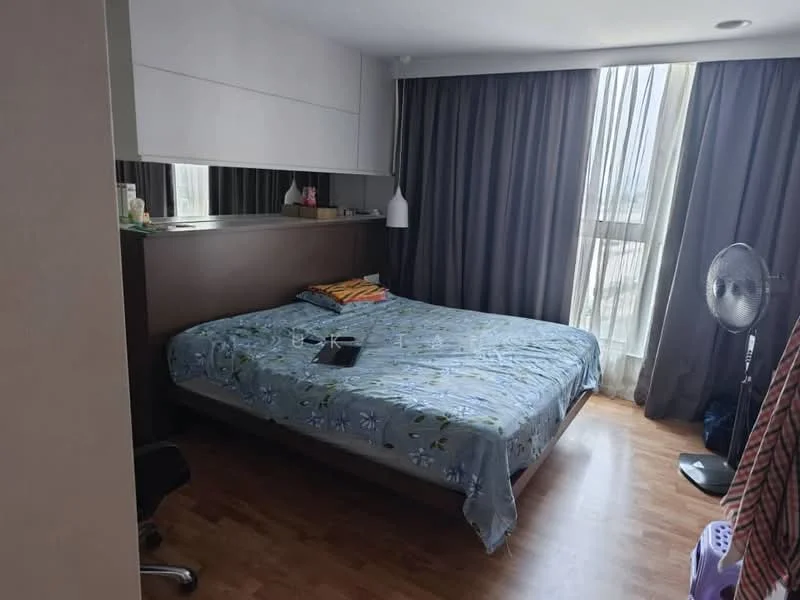 Bedroom features: queen-size bed with floral bedding, wooden flooring, floor-to-ceiling windows, grey curtains, wall-mounted mirror, desk chair, ceiling light fixture, standing fan; style: modern; view: city.
