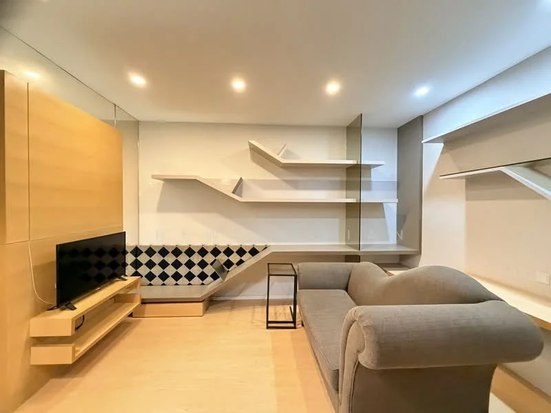 Living features: grey fabric sofa, black and white checkered accent wall, wall-mounted TV, light wood TV console, floating shelves, light wood flooring, recessed LED downlights, decorative wall paneling; style: modern.