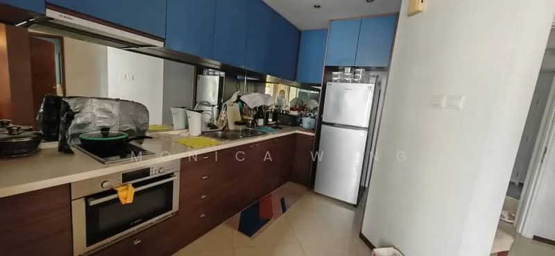 Kitchen features: blue upper cabinets, brown lower cabinets, stainless-steel sink, chrome pull-down faucet, built-in oven, freestanding fridge, ceramic tile flooring, countertop with breakfast bar, kitchen appliances visible, kitchen utensils and cookware visible, area rug with geometric pattern; style: modern.