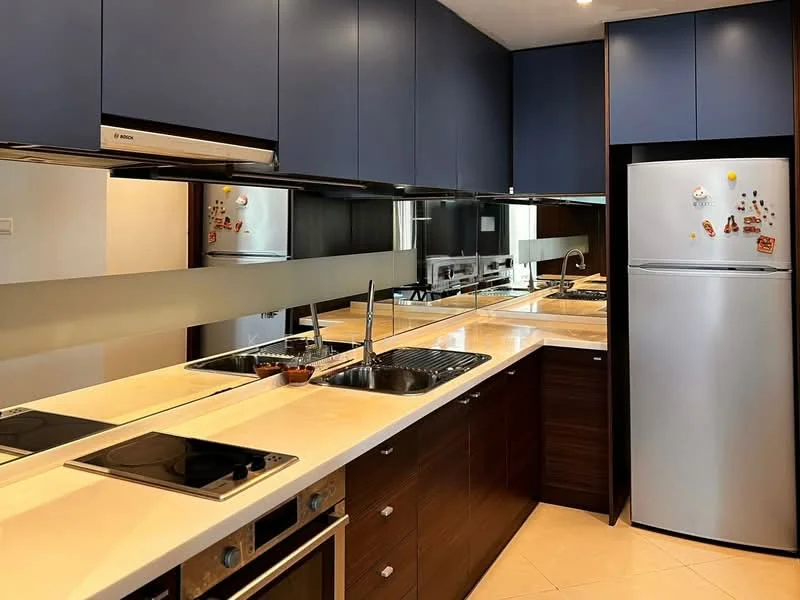Kitchen features: blue cabinetry, brown lower cabinets, white countertop, double-bowl stainless-steel sink, chrome pull-down faucet, built-in oven, 4-burner induction hob, stainless-steel fridge, mirrored backsplash, tile flooring, under-cabinet lighting, kitchen island, open shelving; style: modern.
