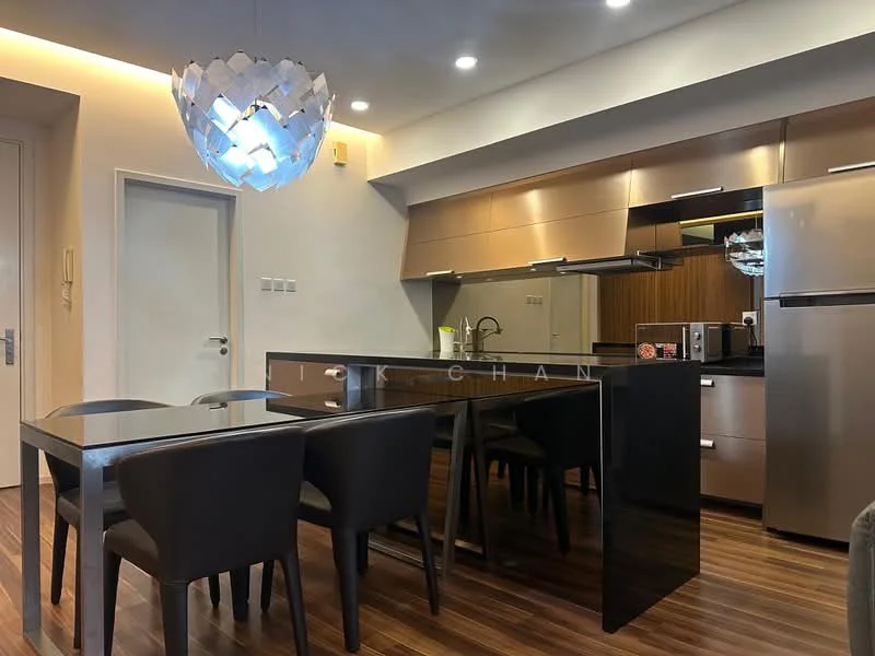 Kitchen features: black granite countertop, stainless-steel appliances, built-in oven, freestanding fridge, wood cabinetry, pendant light fixture, 4-seater dining table, black leather dining chairs, recessed lighting, wood laminate flooring, open layout, kitchen island with seating; style: modern.