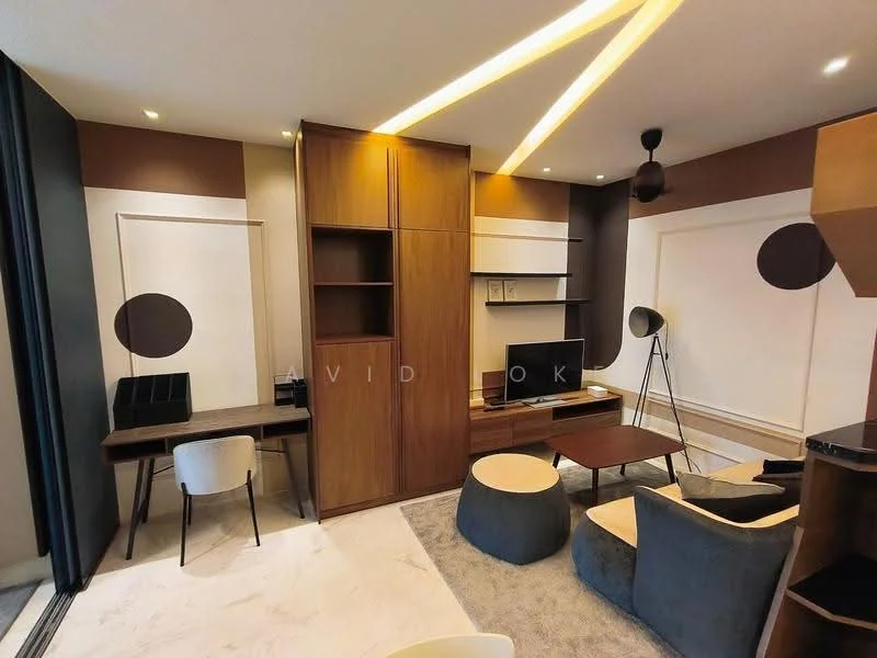 Living features: light wood cabinetry, dark wood accent wall, white painted walls, marble flooring, 3-seater fabric sofa in grey, 2 accent chairs in grey, round coffee table, floor lamp, study desk with chair, wall-mounted TV, decorative wall art, recessed lighting, ceiling fan with light, large glass sliding door; style: modern.