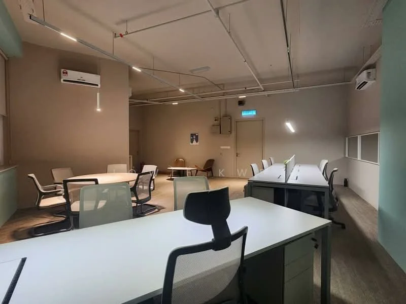 Room features: white desks, black office chairs, wooden flooring, exposed ceiling with lighting, wall-mounted air conditioning unit, large windows, neutral wall color, multiple workstations, task lighting, open layout; style: modern.