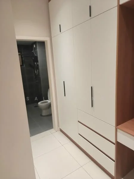 Room features: built-in cabinetry with white finish, wooden drawer fronts, white tiled flooring, neutral wall color, doorway leading to bathroom, modern door handle, minimalist design, light fixtures not visible; style: modern.