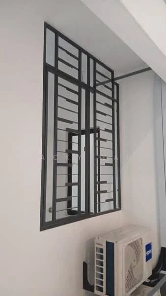 Room features: decorative metal grille window, mirror, wall-mounted split AC.